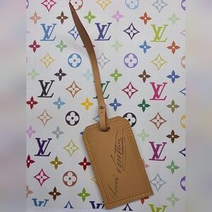 Louis Vuitton NeverFull MM Luggage Tag....pays Tribute To The Heritage Of LV